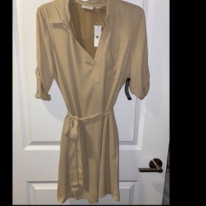 Belted dress with removable belt.